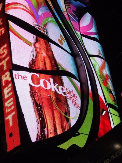animated billboard that promotes Coke in Times Square in New York City